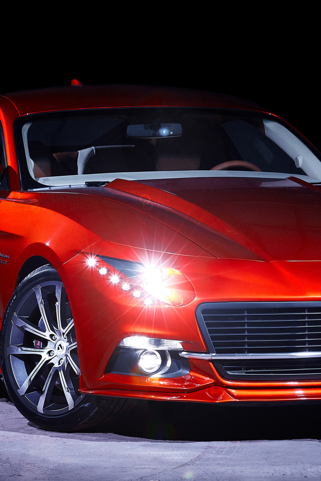 Красный автомобиль Warszawa M20 GT 2018 года с включенными фарами