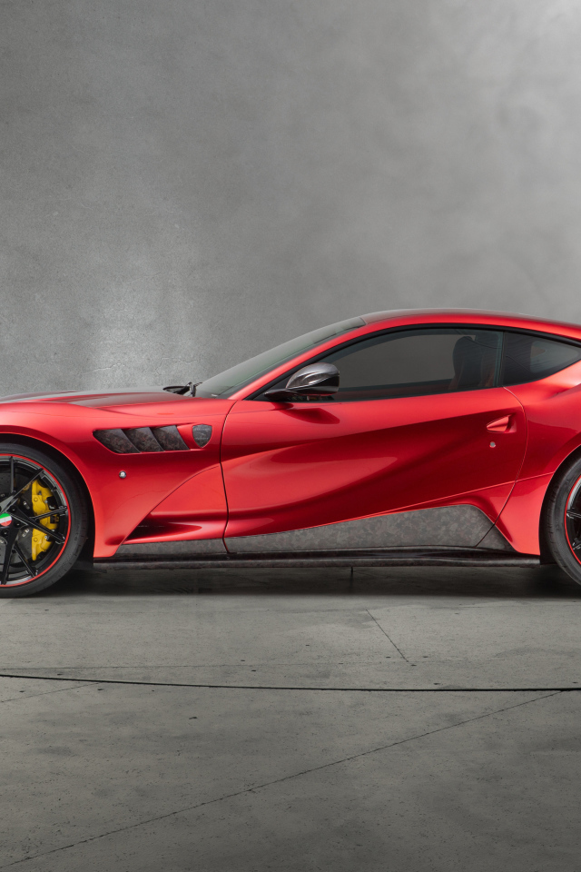 Красный спортивный автомобиль Mansory Stallone 2018 года вид сбоку