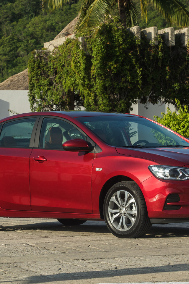 Красный автомобиль Chevrolet Cavalier Premier