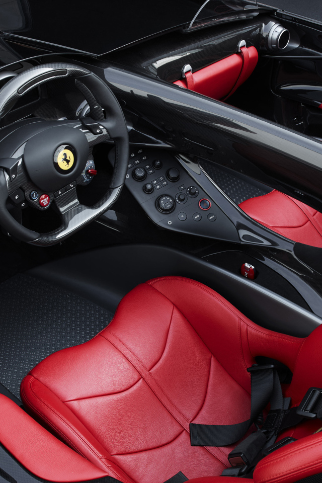 Стильный кожаный салон автомобиля ferrari monza