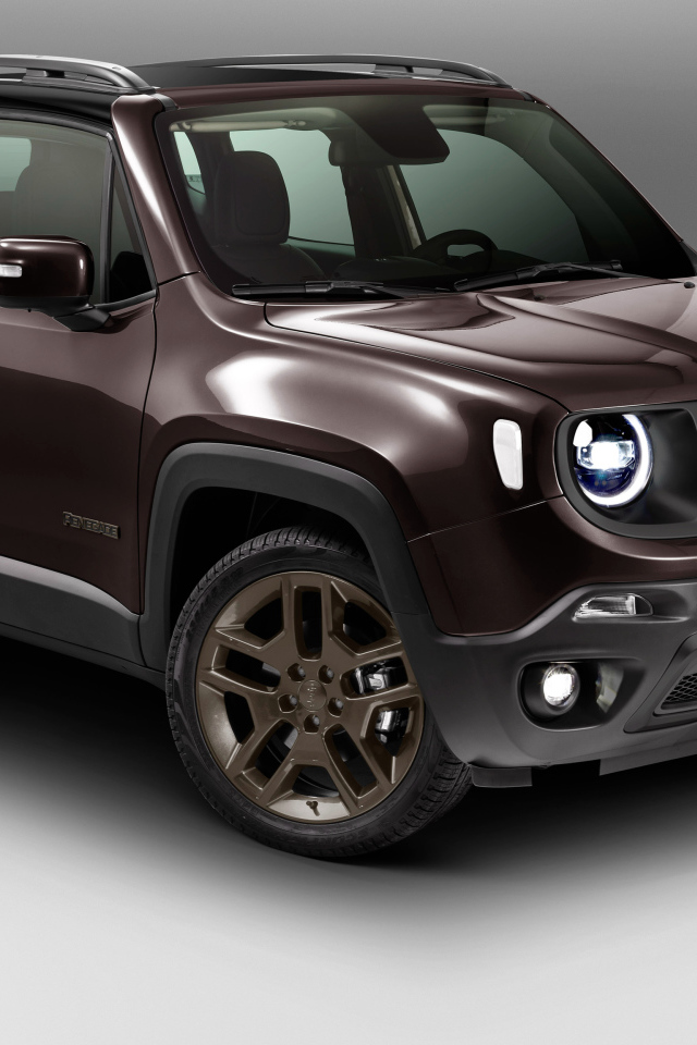 Brown 2018 Jeep Renegade on a gray background