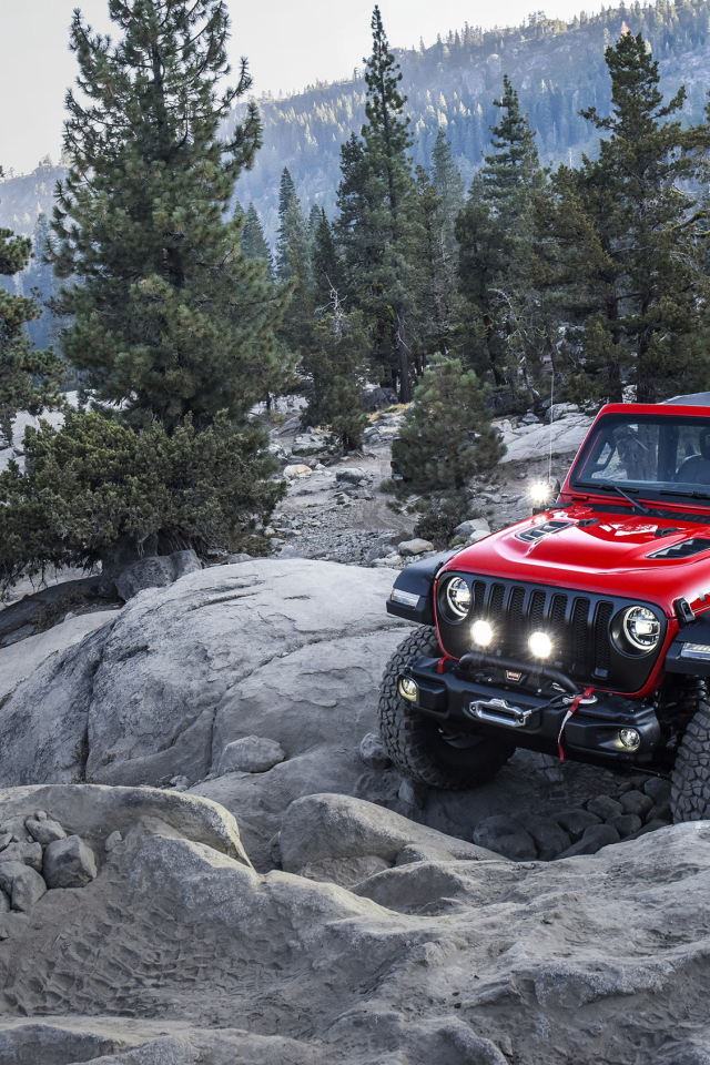 Red SUV Jeep Wrangler With Mopar, 2018 in the mountains