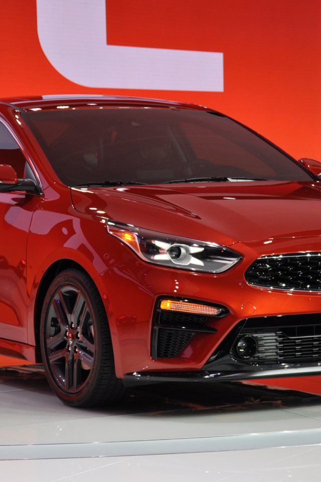 Red new car Kia Forte 2019 in the store