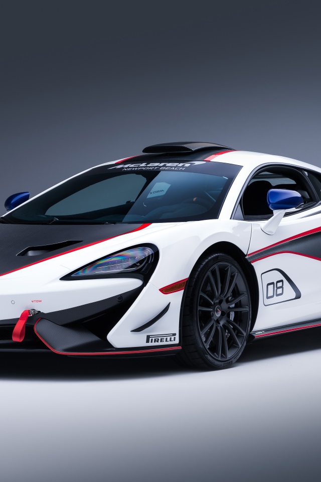 Спортивный автомобиль McLaren MSO X, 2018 на сером фоне