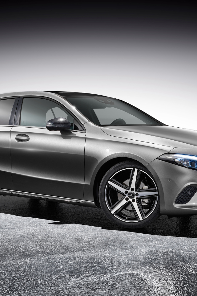 Silver car Mercedes A Class Accessories, 2018 on a gray background