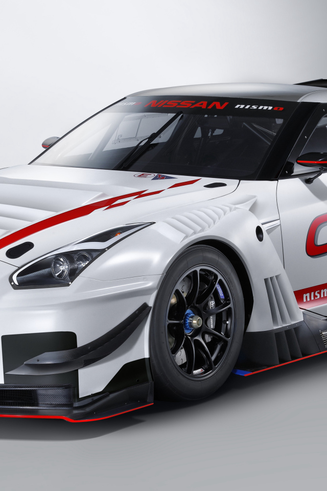 Спортивный автомобиль Nissan GT-R Nismo GT3, 2018 на сером фоне