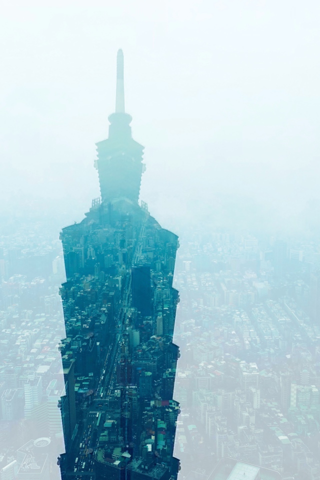 Силуэт небоскреба на фоне города