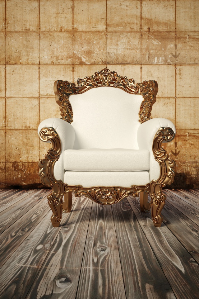 Белое новое кожаное кресло на деревянном полу у старой стены