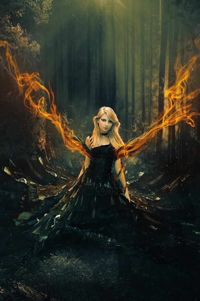 Фантастическая девушка в черном платье с огненными крыльями