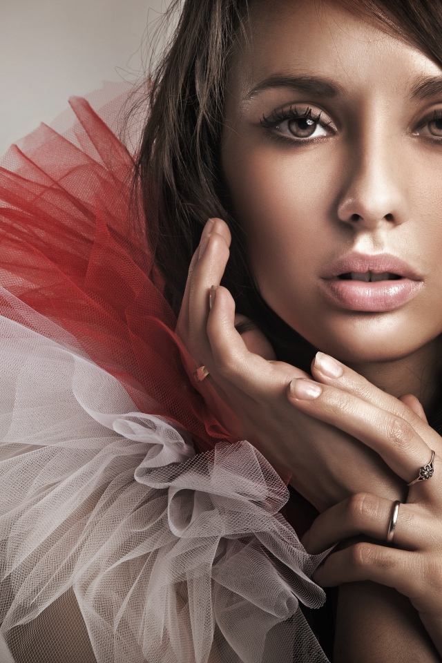 Beautiful brunette girl with a colorful collar