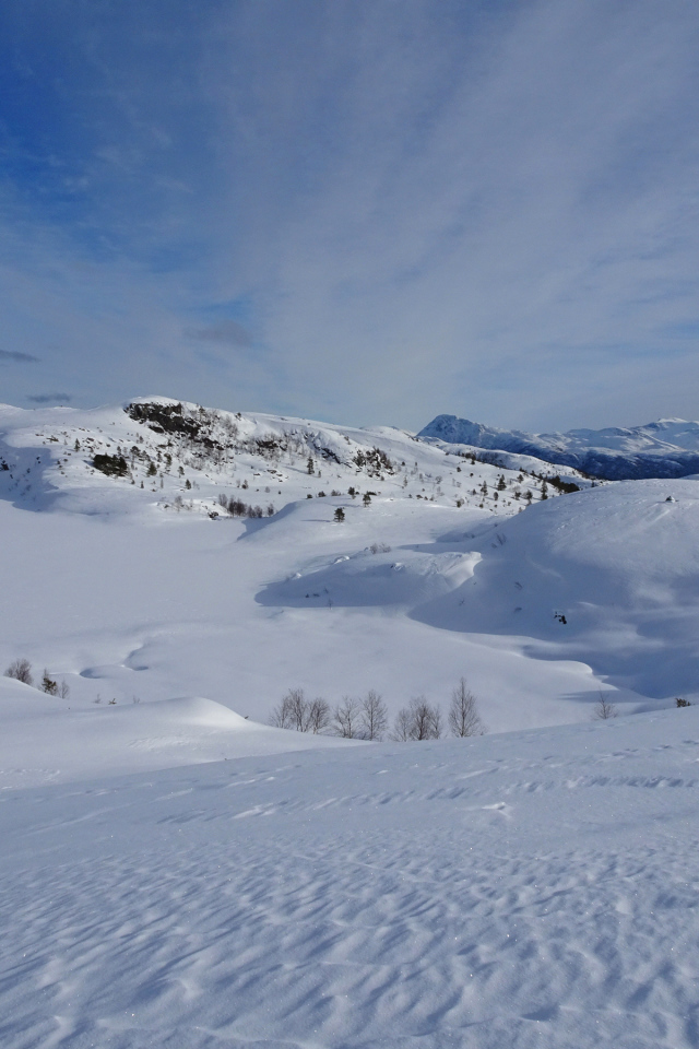 Заснеженные склоны под зимним небом, Норвегия