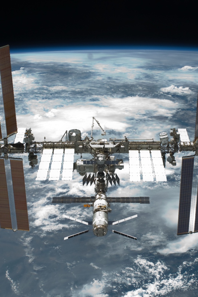 Космическая станция над планетой Земля