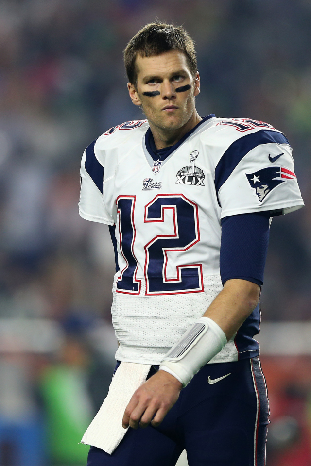 Игрок в американский футбол Том Брэди