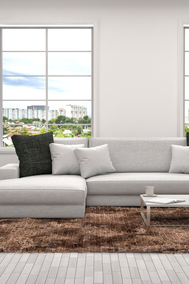 Гостиная комната с большим диваном и окнами в сером цвете 