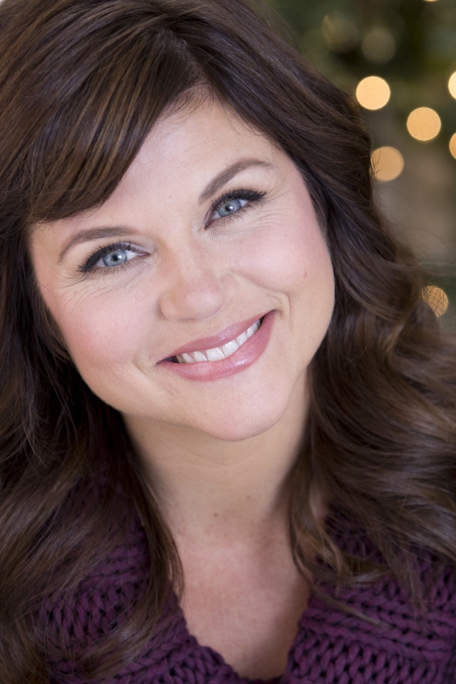 Милая голубоглазая улыбающаяся актриса Тиффани Тиссен