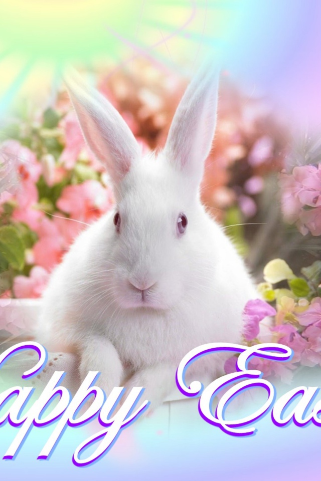 Большой белый кролик с крашеными яйцами на Пасху