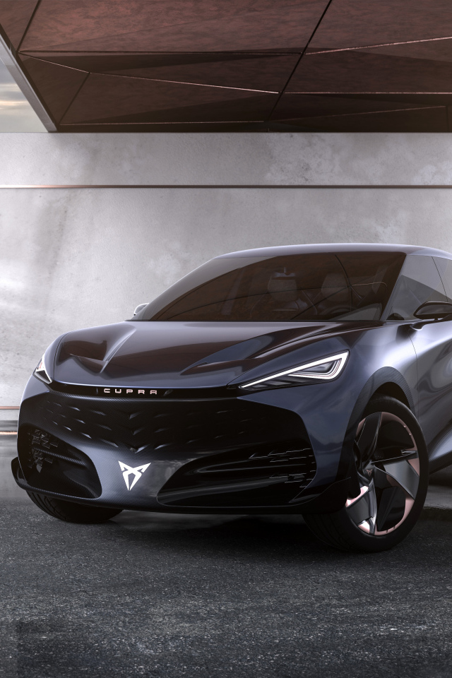 Черный автомобиль Cupra Tavascan Concept в здании 