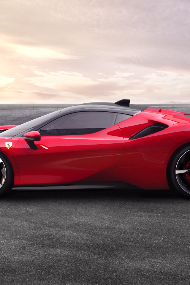 Красный спортивный автомобиль Ferrari SF90, 2019 года вид сбоку