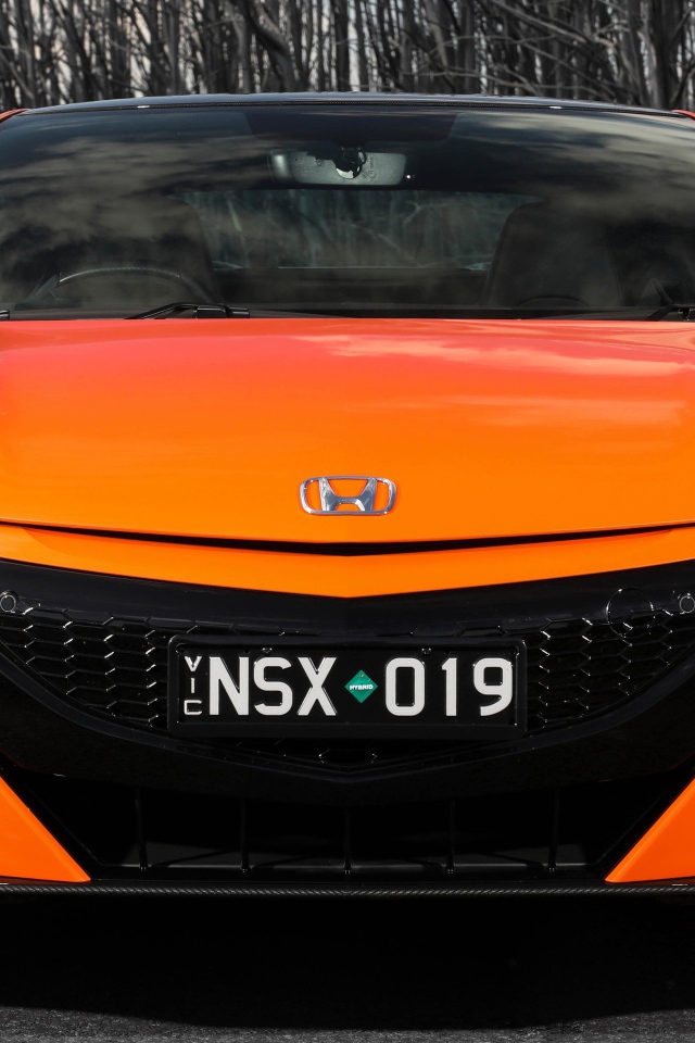 Оранжевый автомобиль Honda NSX 2019  вид спереди