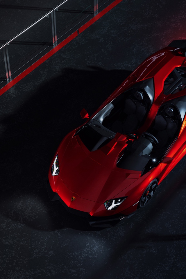 Красный спортивный автомобиль Lamborghini Aventador J CGI вид сверху