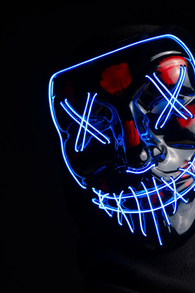 Неоновая маска анонимуса на черном фоне