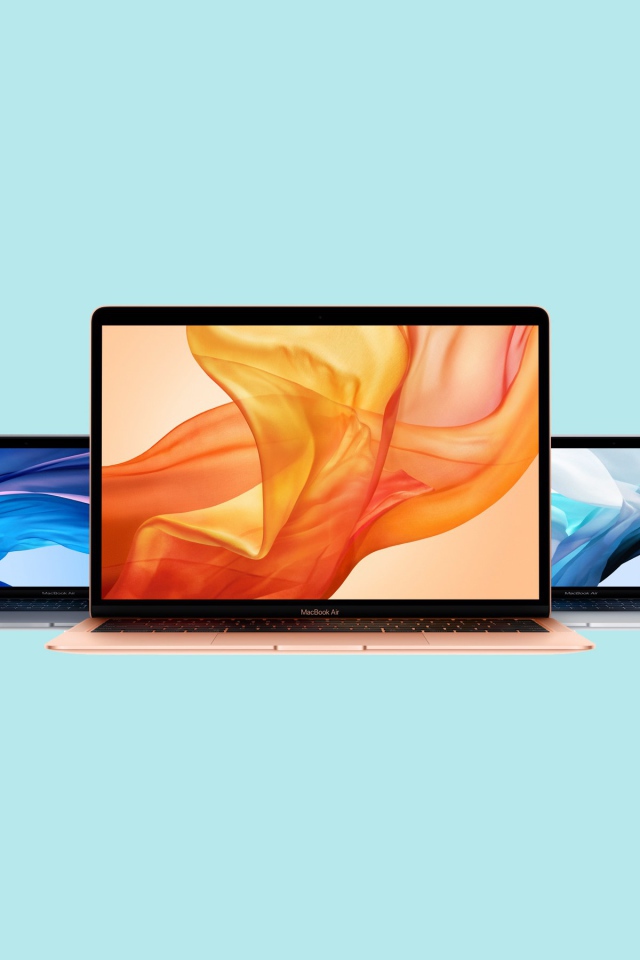 Тонкие макбуки MacBook Air на голубом фоне