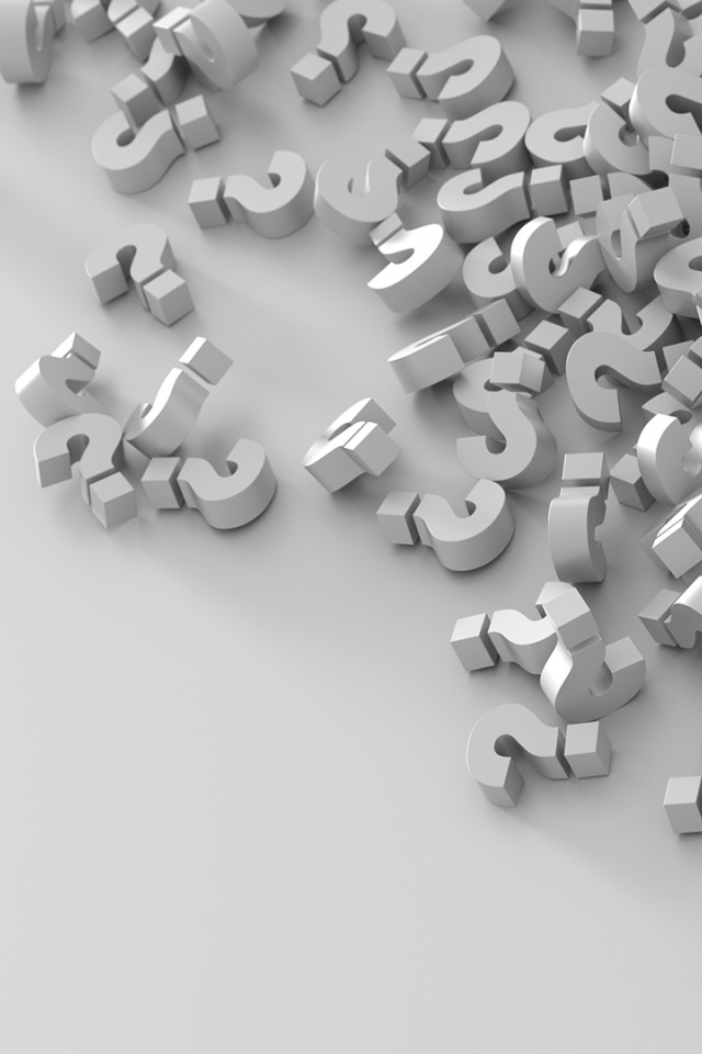 Много знаков вопроса на серой поверхности 