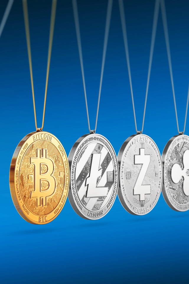 Different coins of electronic currencies on a blue background