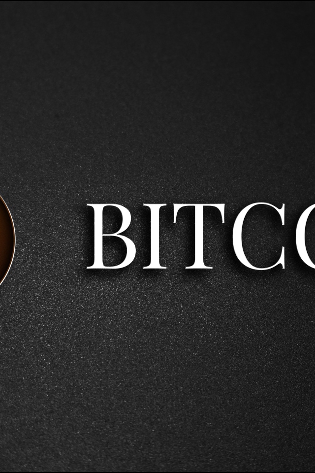 Надпись Биткоин на сером фоне