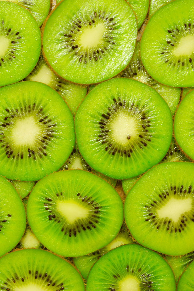Фон из сочных кусочков киви крупным планом