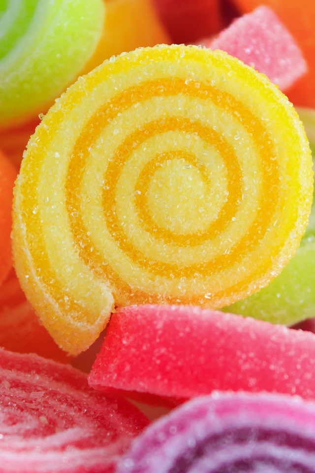 Разноцветный  сладкий мармелад в сахаре крупным планом