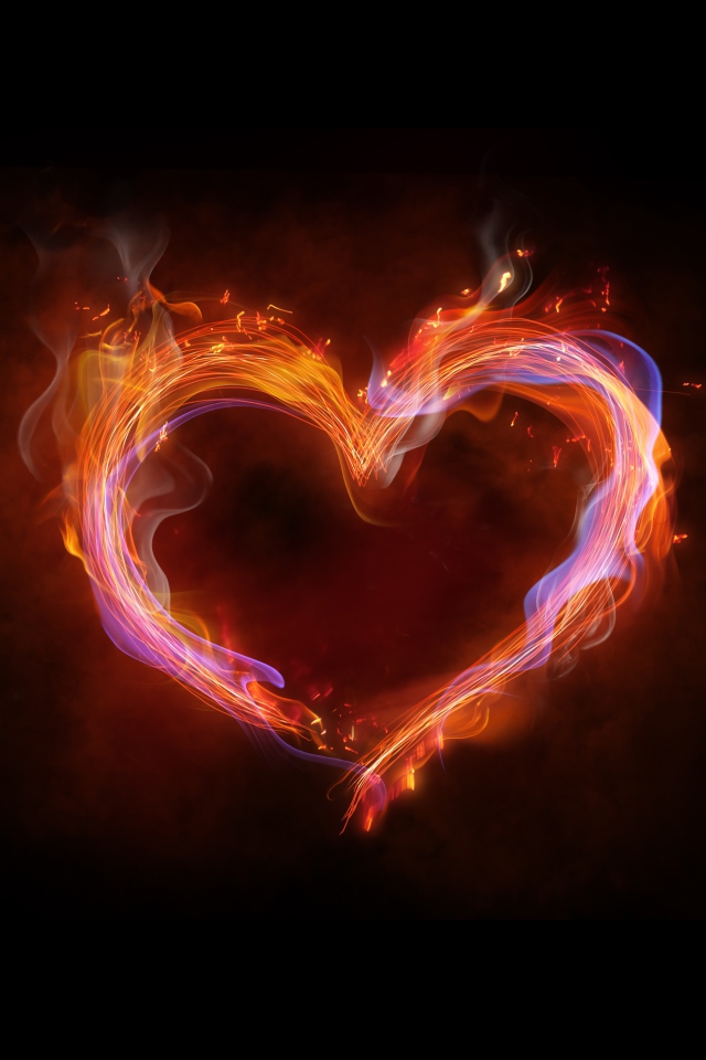 Огненное неоновое сердце на черном фоне