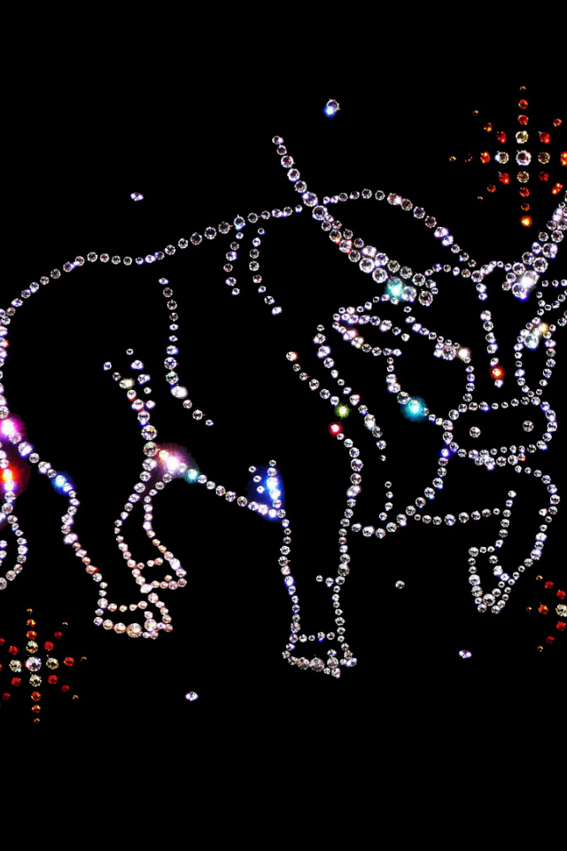 Блестящий знак зодиака телец на черном фоне