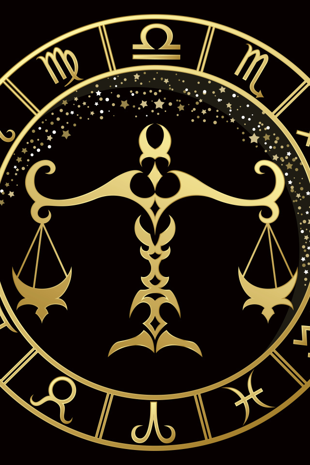 Золотой знак зодиака весы на черном фоне
