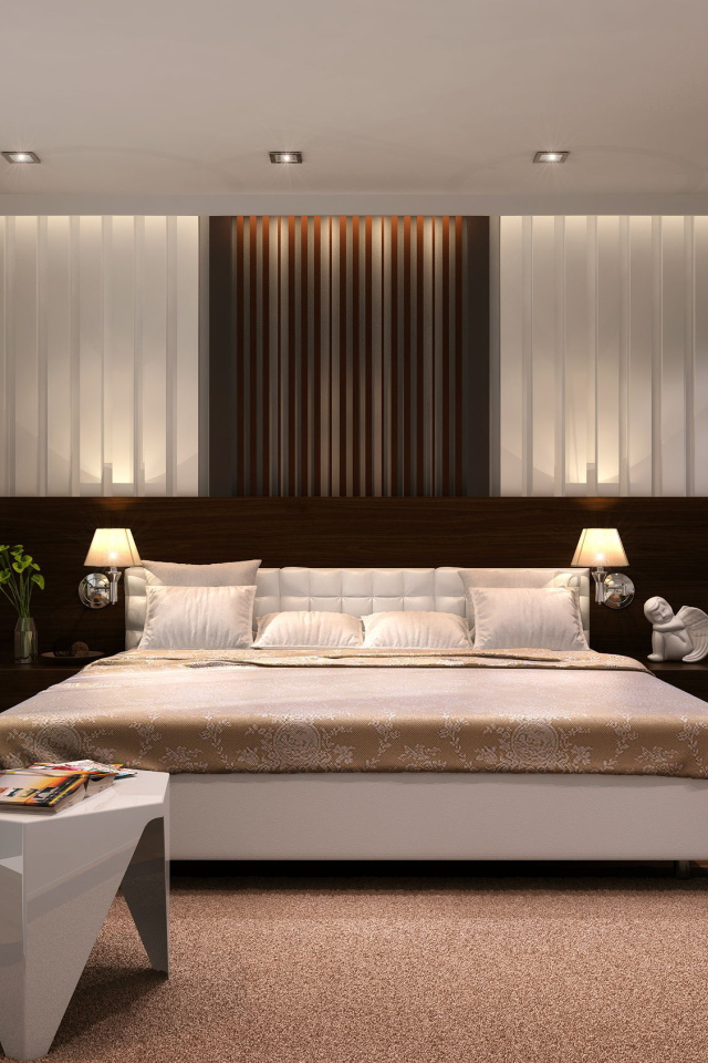 Большая кровать в просторной спальне со шкафом 