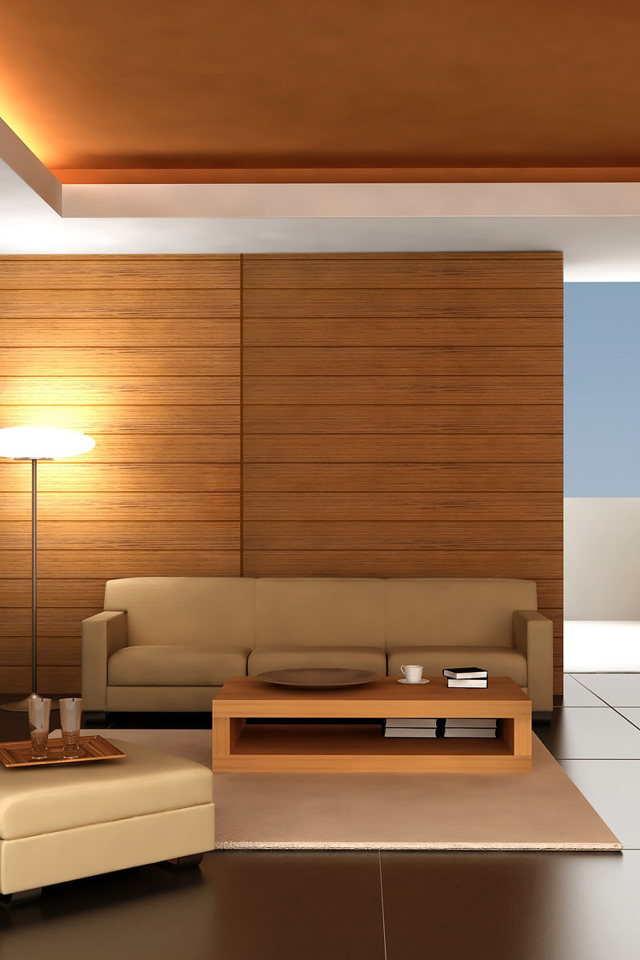 Большая комната с деревянными стенами и кожаными диванами