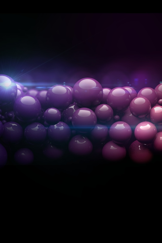 Нить из разноцветных шаров на черном фоне 