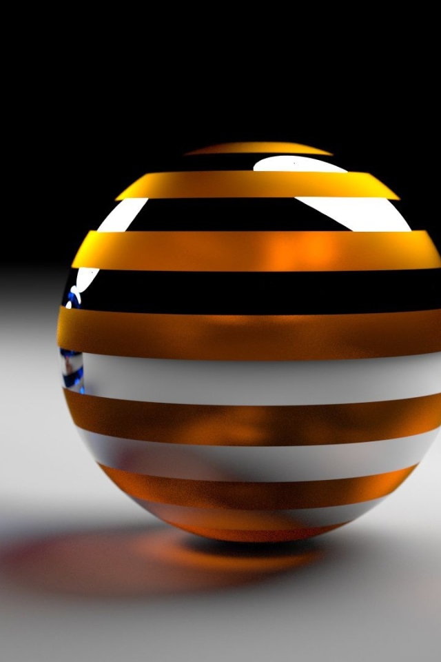 Разноцветные 3д шары на серой поверхности 