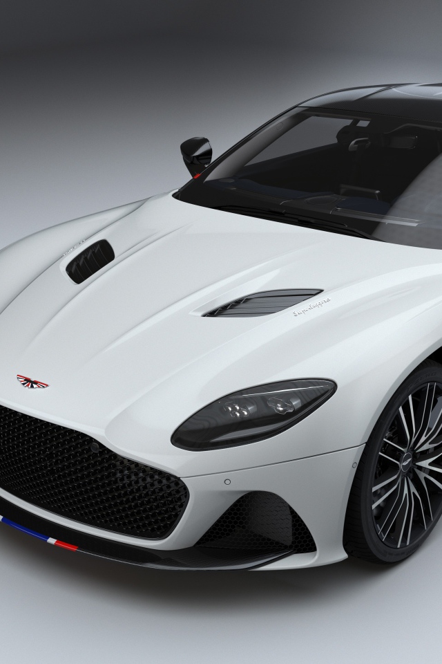 Белый автомобиль Aston Martin DBS Superleggera Concorde Edition 2019 года на сером фоне