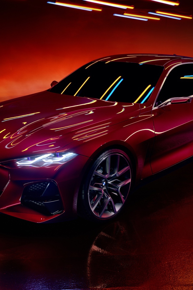 Красный автомобиль BMW Concept 4 2019 года на красном фоне