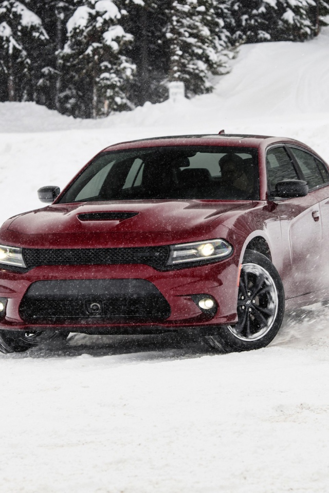 Red 2020 Dodge Charger GT AWD rides in the snow