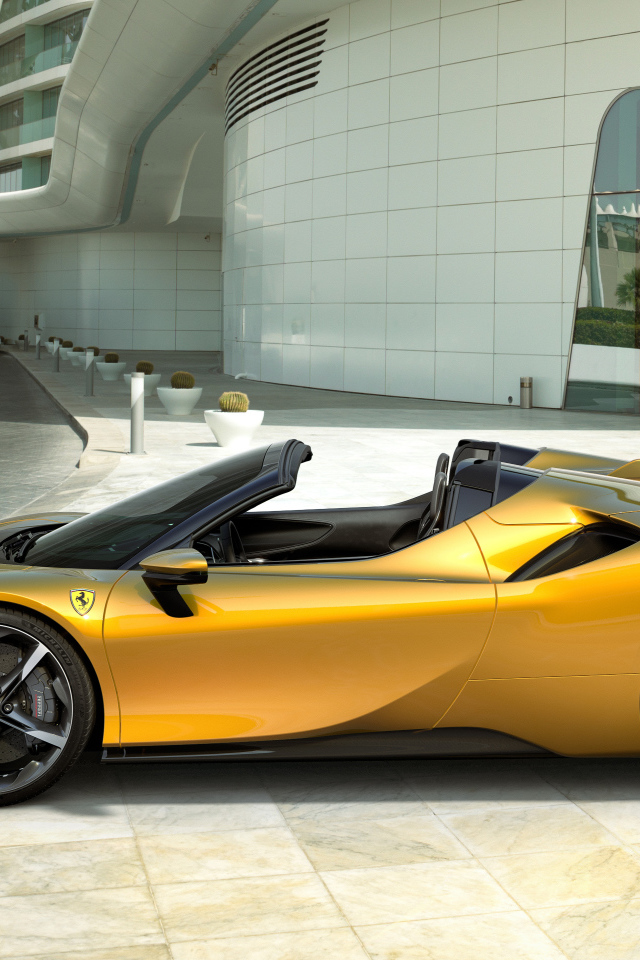 Автомобиль кабриолет Ferrari SF90 Spider 2021 года вид сбоку