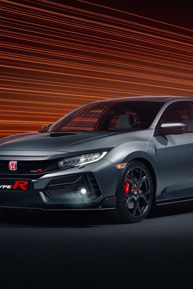 Серебристый автомобиль Honda Civic Type R Sport Line 2020 года на фоне лучей 