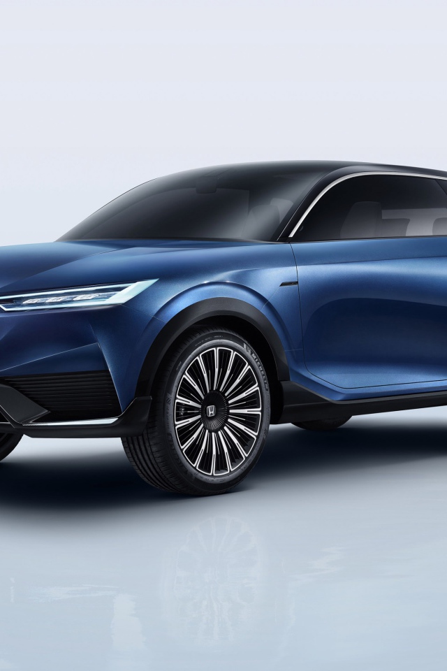 Синий автомобиль Honda SUV Econcept 2020 года на сером фоне