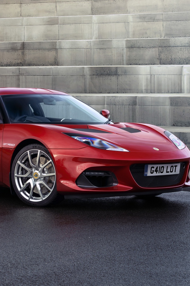 2020 fast red car Lotus Evora GT410 at the steps