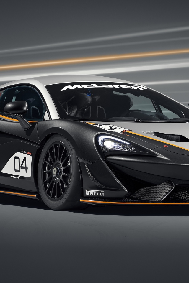 Спортивный автомобиль McLaren 570S GT4 2020 года на сером фоне