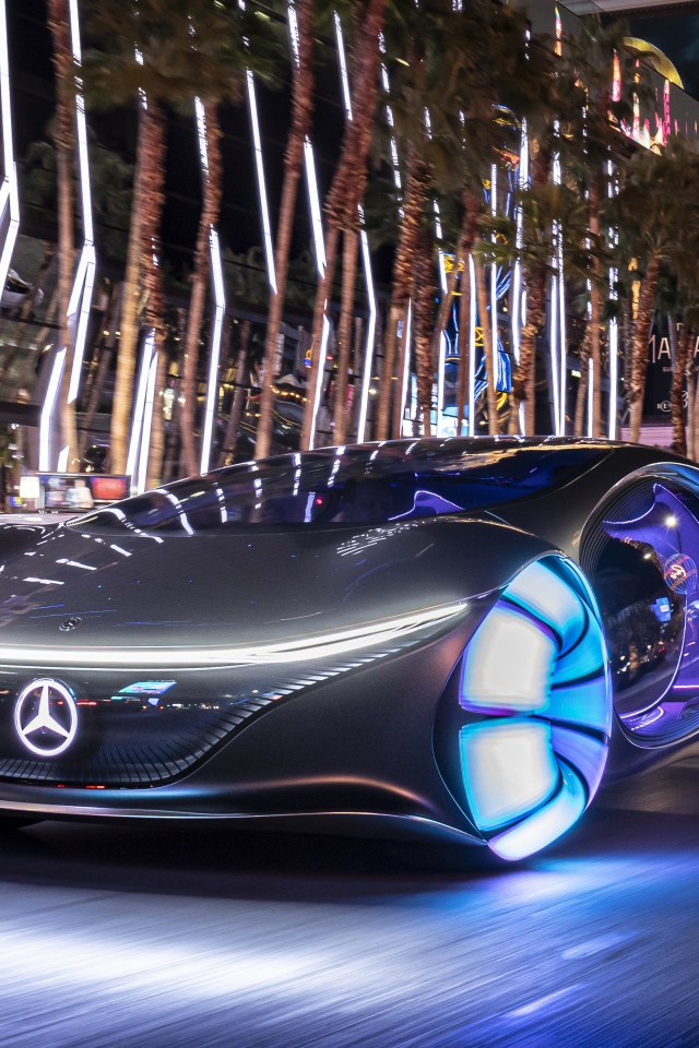 Автомобиль Mercedes-Benz VISION AVTR, 2020 года с неоновыми колесами на улице