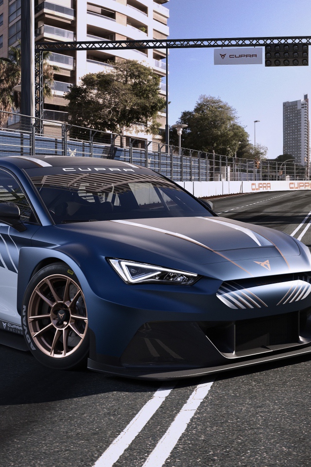 Стильный автомобиль Cupra Leon E-Racer 2020 года на гонках 
