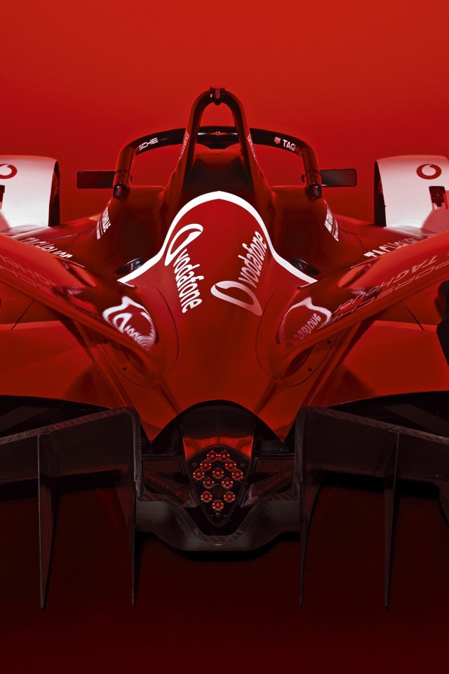 Красный гоночный автомобиль Porsche 99X Electric 2019 года 