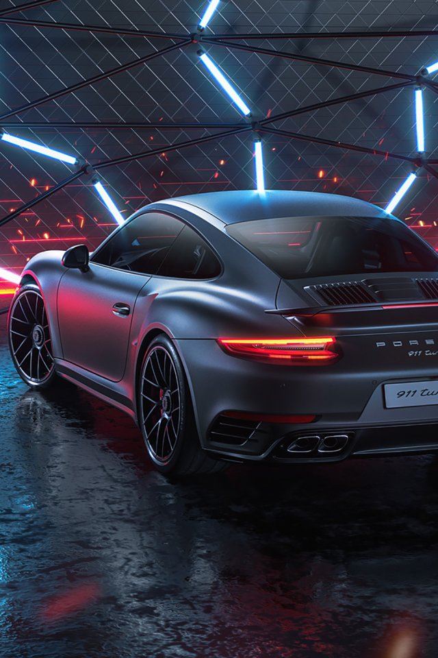 Серебристый автомобиль Porsche 911 Turbo S 